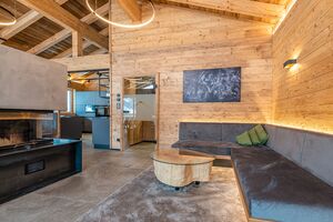 Projekt Chalets Schladming_Wohnzimmer mit offenem Kamin